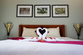 Отель Louto Dmell Guesthouse  Денпасар